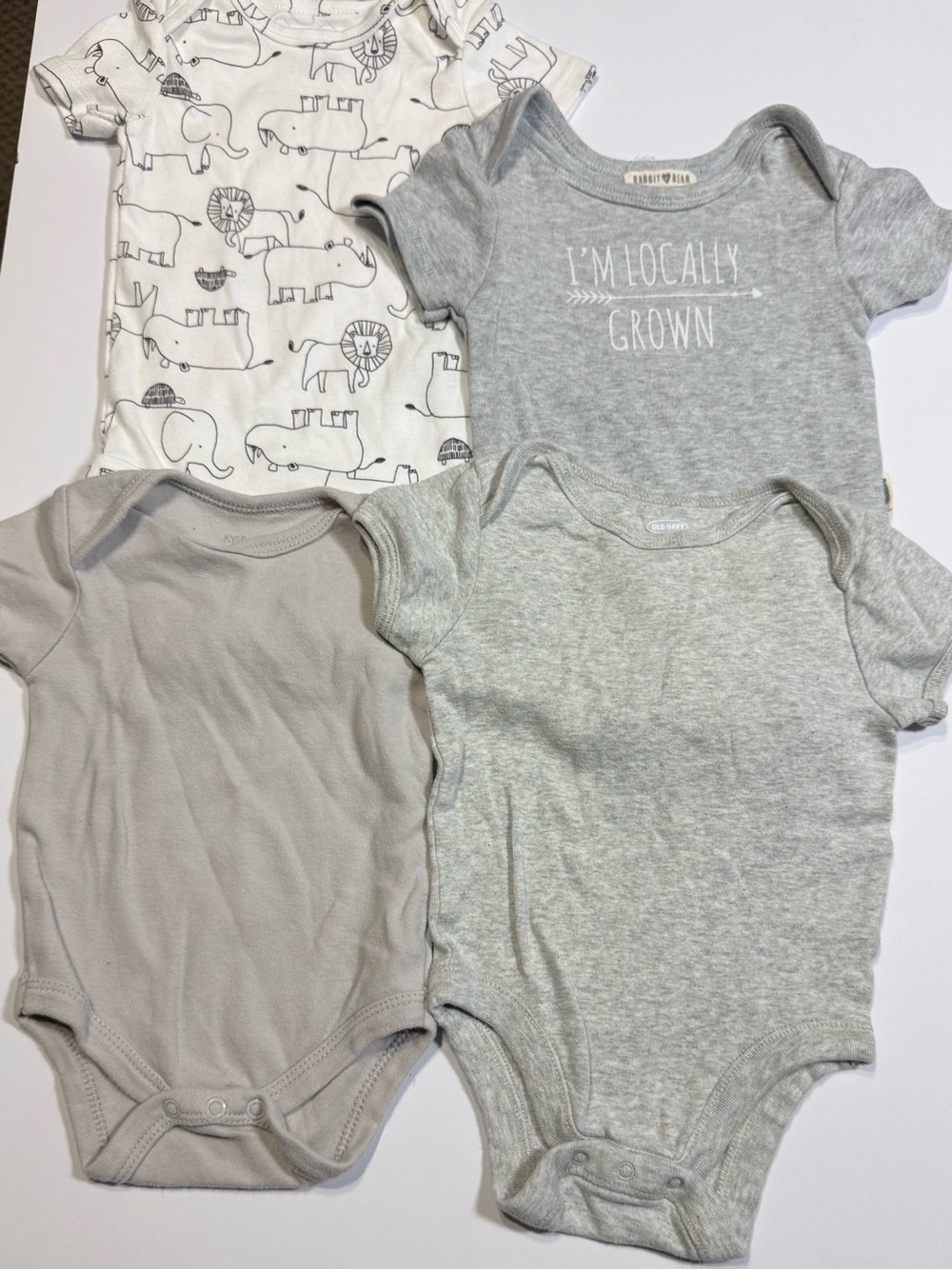 3-6 month onesies. Lot of 4.